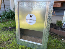 Load image into Gallery viewer, Feed automatically dispenses down the hopper evenly distributing the feed at the bottom of the feed tray for easy access for the chickens.